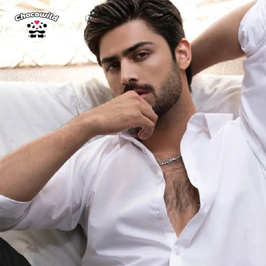 Confident man with subtle, knowing expression.