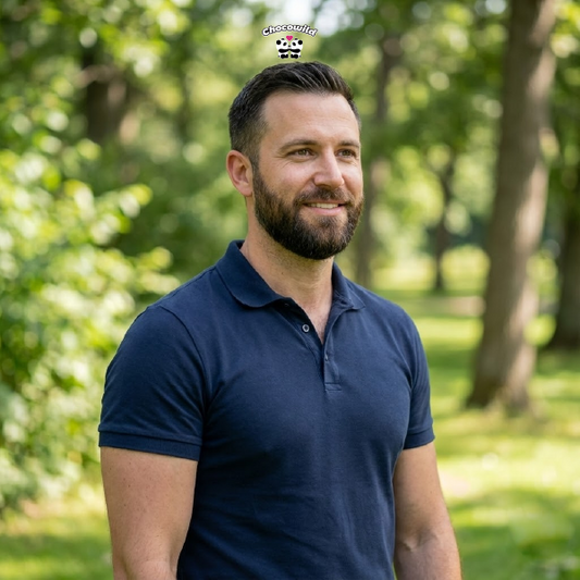 Confident man smiling outdoors representing peak mens sexual performance.